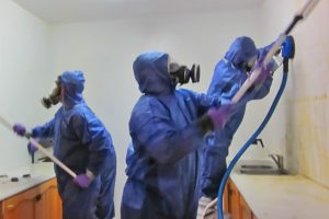Xtreme Home Improvement technicians in the process of biohazard clean up